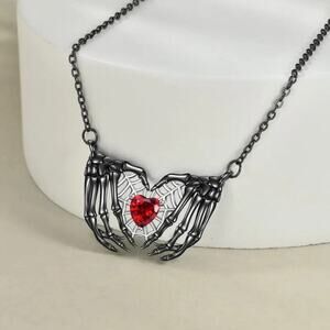 NEW Gothic Skeleton Hands Heart Necklace – Black Pendant with Red Crystal